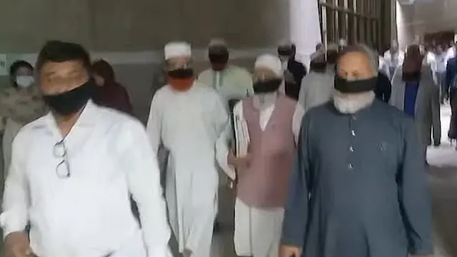 মানবাধিকার কমিশন বিলের প্রতিবাদে কালো কাপড়ে মুখ ঢেকে বিরোধীদের সংসদ ত্যাগ